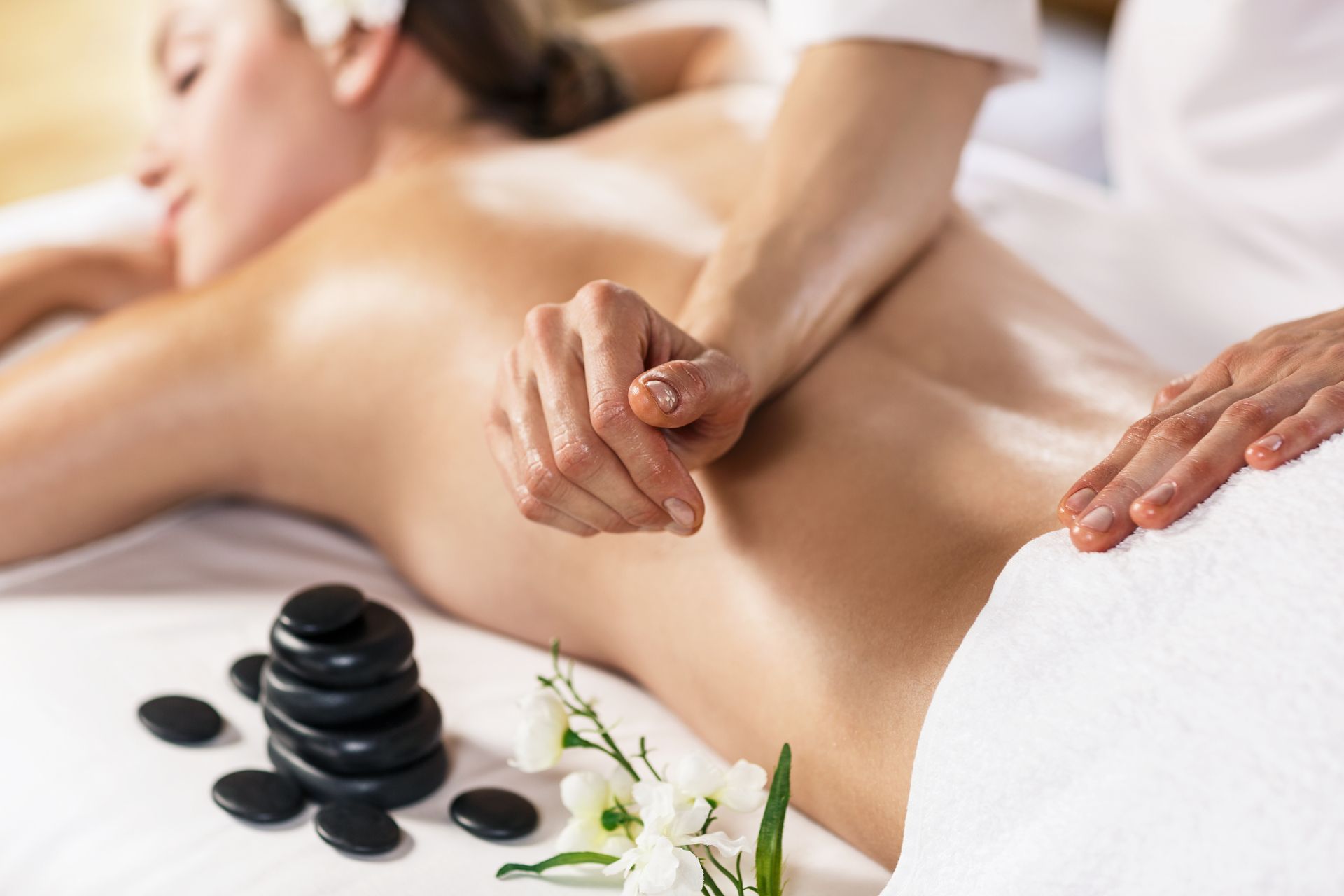 Normale Massage und Hot Stone Massage